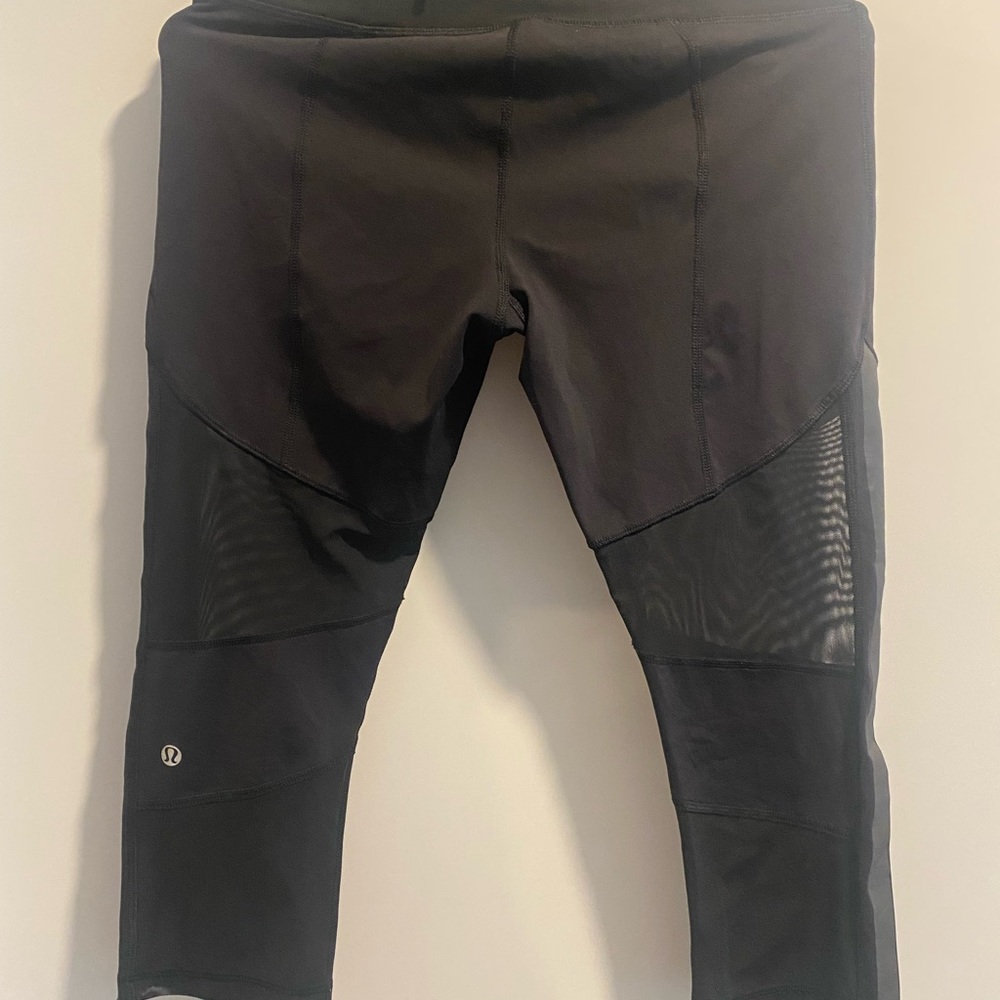 Lululemon black capri leggings with sheer panels size 8